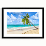Black-framed wall art collection showcasing a serene beach landscape, featuring soft pastel colors and a mat for an elegant display. Ideal for coastal-themed decor.