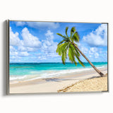 Framed canvas wall art showcasing a serene beach landscape with vibrant colors, featuring silver trim, ideal for enhancing home decor and creating a calming atmosphere.