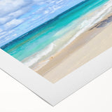 Rolled canvas wall art depicting a serene beach landscape, showcasing gentle waves and vibrant sunset colors, ideal for enhancing home decor.