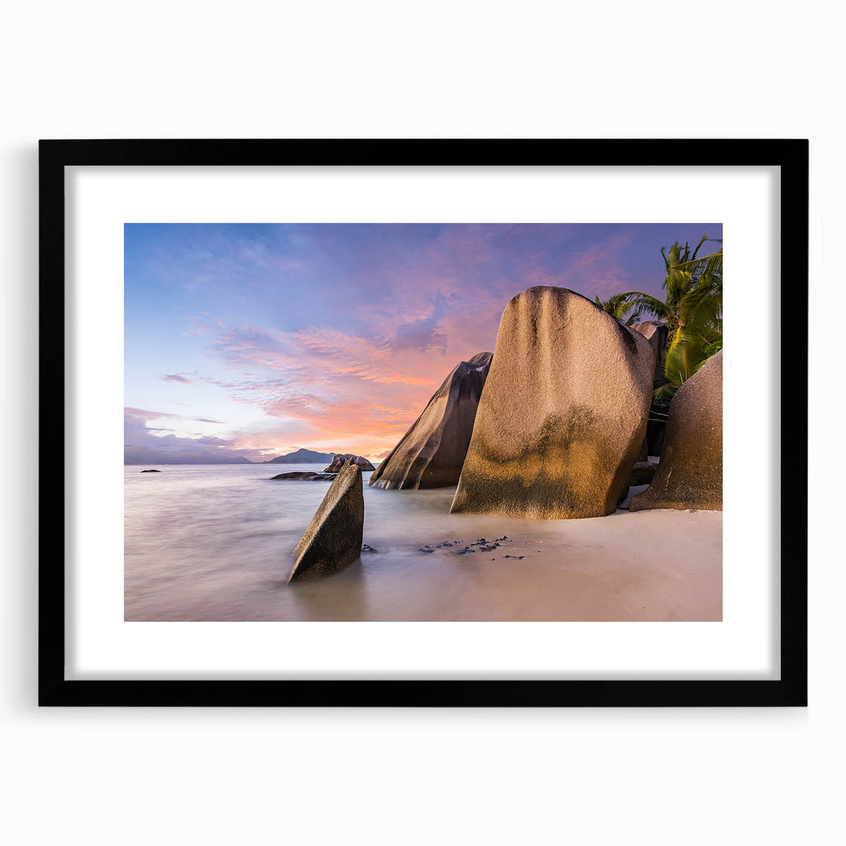 Framed wall art featuring a serene beach landscape design with vibrant colors, set in a sleek black frame with a white mat, ideal for home decor enhancement.