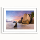 Framed white wall art featuring a serene beach landscape design, highlighted by soft blue and sandy beige tones, perfect for coastal decor enthusiasts.