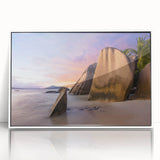 Framed wall art collection showcasing a serene beach landscape with vibrant colors, set in a sleek white frame, perfect for enhancing modern home decor.