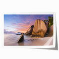 Vibrant rolled art print showcasing a serene beach landscape with soft waves and a clear blue sky, ideal for home decor and relaxation themes.