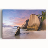 Stretched canvas wall art featuring a serene beach landscape with vibrant blues and soft sandy hues, ideal for enhancing modern coastal decor in homes or offices.