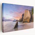 Stretched canvas wall art showcasing a serene beach landscape with vibrant colors, perfect for coastal-themed decor, viewed from the side to highlight its depth.