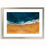 Silver-framed wall art featuring a serene beach landscape design, showcasing vibrant colors and intricate details, perfect for enhancing home decor and ambiance.