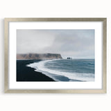 Framed wall art featuring a serene beach landscape design, showcasing soft blue skies and gentle waves, presented in a sleek silver frame with a mat for an elegant finish. Perfect for adding a tranquil coastal vibe to any interior space.