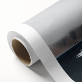 Rolled canvas showcasing a vibrant beach landscape design, featuring vivid blues and sandy tones, ideal for coastal-themed decor and wall art collections.