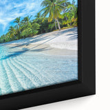 Framed canvas wall art showcasing a vibrant beach landscape with vivid blues and sandy hues, ideal for coastal-themed decor and home aesthetics.