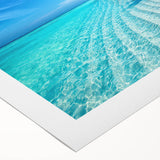Rolled canvas artwork showcasing a vibrant beach landscape design, featuring soft pastel colors and serene ocean waves, ideal for home decor or coastal themes.