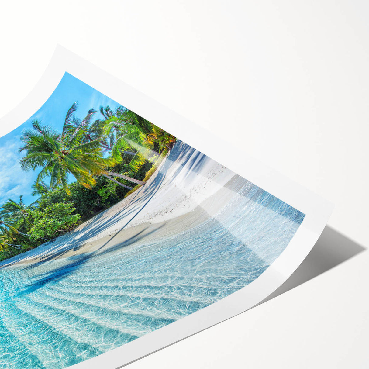 Vibrant rolled print showcasing a serene beach landscape with turquoise waters and golden sands, perfect for home decor or coastal-themed interiors.