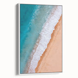 Framed canvas wall art showcasing a serene beach landscape design with soft pastel colors, perfect for home decor. Side view highlights the elegant white frame.