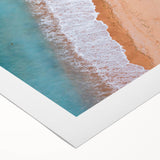 Rolled canvas showcasing a vibrant beach landscape design with soft hues of blue and beige, ideal for coastal decor. Packaged securely in a cardboard tube for safe shipping.