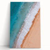 Stretched canvas wall art showcasing a vibrant beach landscape with blue skies and golden sand, ideal for enhancing coastal-themed home decor.