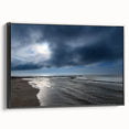 Framed canvas wall art depicting a serene beach landscape, designed with vibrant colors and intricate details; features a sleek black frame for an elegant presentation.