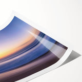 Vibrant beach landscape wall art print showcasing a tranquil ocean scene with soft waves and a colorful sunset, rolled for easy framing and display.