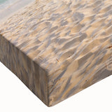 Close-up of a stretched canvas wall art piece showcasing a vibrant beach landscape design, featuring vivid blues and sandy tones, ideal for coastal decor enthusiasts.