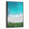 Framed canvas wall art showcasing a serene beach landscape with vibrant colors, featuring a black frame and a side view, perfect for home decor.