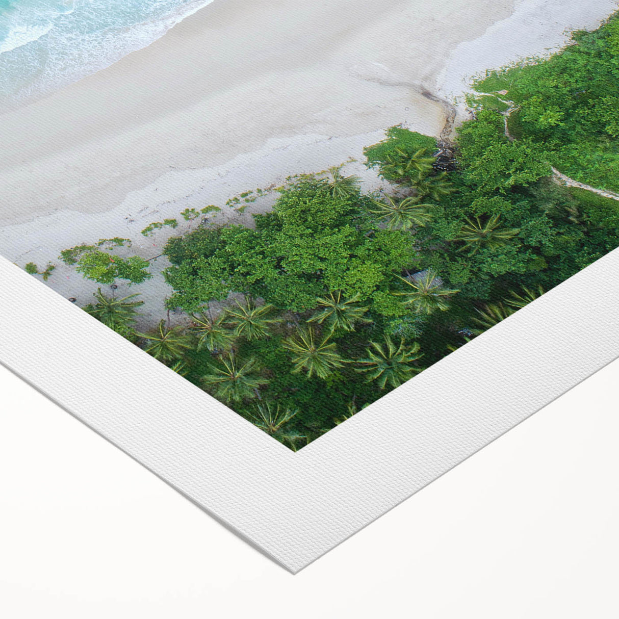 Colorful rolled canvas wall art showcasing a serene beach landscape with golden sand, turquoise waves, and vibrant sky, ideal for coastal decor enthusiasts.