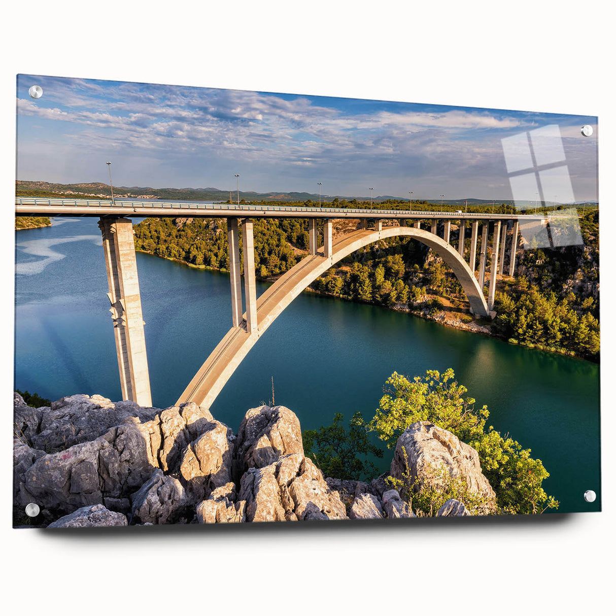 Acrylic glass wall art featuring a modern landscape bridge design, elegantly displayed from the side with decorative pins, perfect for enhancing contemporary interiors.