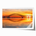 Rolled art print showcasing a vibrant landscape with a modern bridge design, featuring rich colors and intricate details, perfect for home decor enhancement.