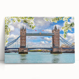 Stretched canvas artwork showcasing a vibrant landscape featuring a serene bridge over water, adorned with lush greenery and soft lighting, perfect for home decor.