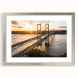 Framed wall art collection showcasing a serene landscape with a bridge, featuring a silver mat and sleek frame, perfect for enhancing home decor elegance.