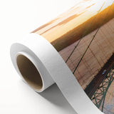 Vibrant rolled canvas showcasing a serene landscape bridge design, ideal for home decor, featuring rich colors and intricate details, packaged securely in a protective tube.