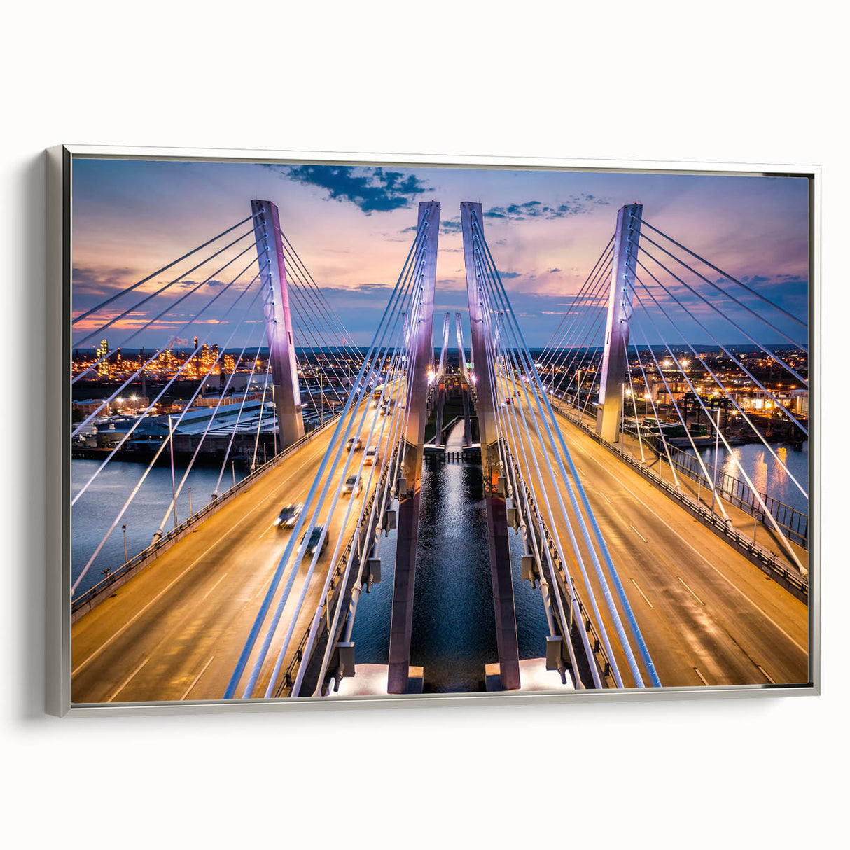 Framed canvas artwork showcasing a contemporary landscape with a bridge, featuring silver accents and a sleek design, perfect for modern home decor.