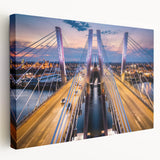 Stretched canvas wall art showcasing a serene landscape with a bridge over a tranquil river, accentuated by vibrant colors and natural scenery, perfect for home decor.