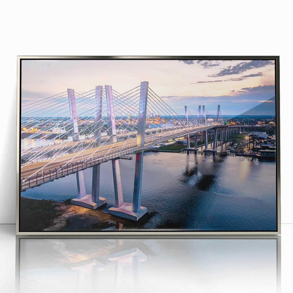 Framed acrylic wall art featuring a contemporary landscape with a bridge, showcasing silver tones and intricate details, perfect for modern home decor.