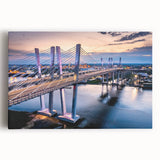Stretched canvas wall art showcasing a vibrant landscape design featuring a serene bridge over a tranquil river, ideal for home decor and enhancing interior aesthetics.