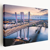 Stretched canvas wall art showcasing a serene landscape with a bridge, featuring vibrant colors and intricate details, perfect for home decor enhancement.
