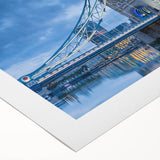 Rolled canvas artwork showcasing a vibrant landscape design with a bridge, featuring rich colors and intricate details, perfect for home decor enhancement.