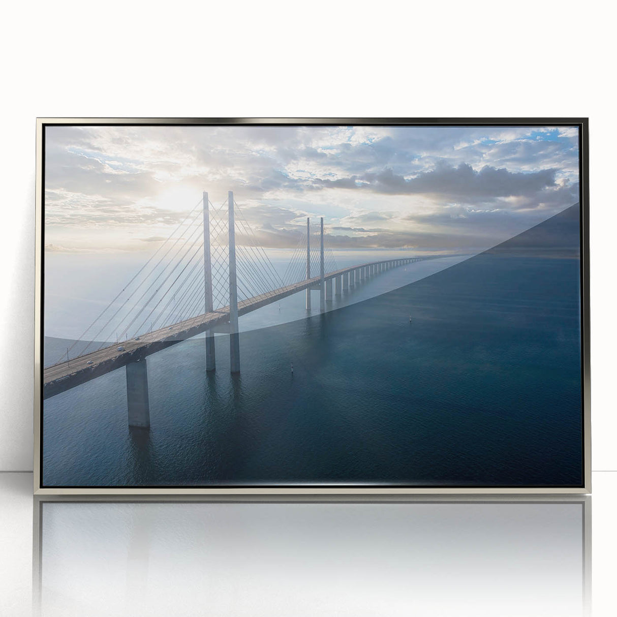 Framed acrylic wall art showcasing a modern bridge design in silver tones, enhancing contemporary decor. Ideal for living room or office spaces, this piece adds sophistication and style.