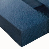 Close-up of a vibrant stretched canvas wall art piece showcasing a serene landscape bridge design, featuring rich colors and intricate details, perfect for home decor.