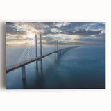 Stretched canvas wall art featuring a serene landscape with a bridge over a tranquil river, showcasing vibrant colors and detailed textures, perfect for home decor.