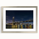 Framed wall art collection featuring a silver mat, showcasing a serene landscape bridge design. Perfectly complements modern decor styles with its elegant aesthetic.