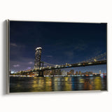 Framed canvas wall art showcasing a modern landscape design with a bridge, featuring a silver frame and vibrant colors, perfect for elevating home decor.