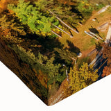 Close-up of a stretched canvas showcasing a vibrant landscape bridge design, featuring rich colors and fine details, ideal for home decor or art collection.