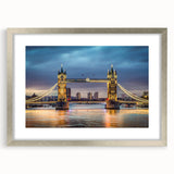 Framed wall art showcasing a modern landscape bridge design, featuring a sleek silver frame and mat, ideal for enhancing contemporary home decor. Perfect for adding a touch of elegance to living spaces.