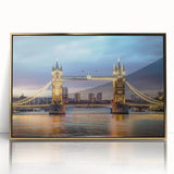 Framed acrylic wall art showcasing a modern landscape bridge design with a gold frame, perfect for enhancing contemporary home decor. The artwork emphasizes vibrant colors and intricate details, ideal for living spaces or offices.