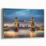 Framed canvas wall art showcasing a stunning landscape with a bridge, featuring a sleek silver frame. The serene scene captures natural beauty, perfect for home decor.