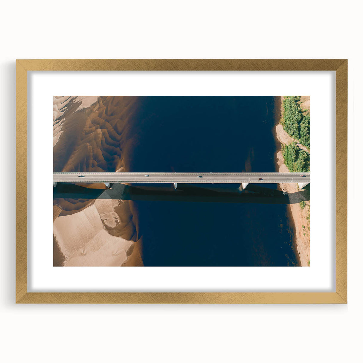 Elegant gold-framed wall art featuring a serene landscape design with a bridge, accented by a white mat, perfect for home decor. Ideal for enhancing interior aesthetics and bringing a touch of nature indoors.