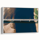Framed canvas wall art featuring a serene landscape with a bridge, showcasing vibrant colors and detailed textures, perfect for home decor enhancement.