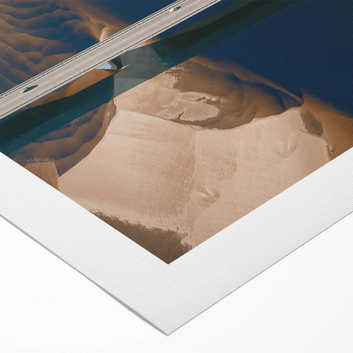 Rolled canvas artwork showcasing a serene landscape bridge scene with vibrant colors, ideal for home decor, neatly packaged in a protective tube.