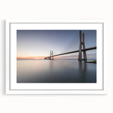 Framed wall art showcasing a serene landscape bridge design, featuring a white mat and sleek frame, perfect for enhancing home decor aesthetics.