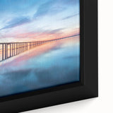 Close-up of a framed canvas wall art piece showcasing a serene landscape with a bridge, featuring vibrant colors and intricate details, perfect for home decor.