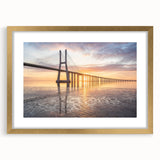 Framed wall art featuring a scenic landscape with a bridge design, set in a stylish gold frame with a mat, ideal for enhancing modern home decor.