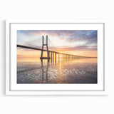 Framed wall art collection showcasing a serene landscape with a bridge, presented in a white mat and frame, perfect for modern home decor.
